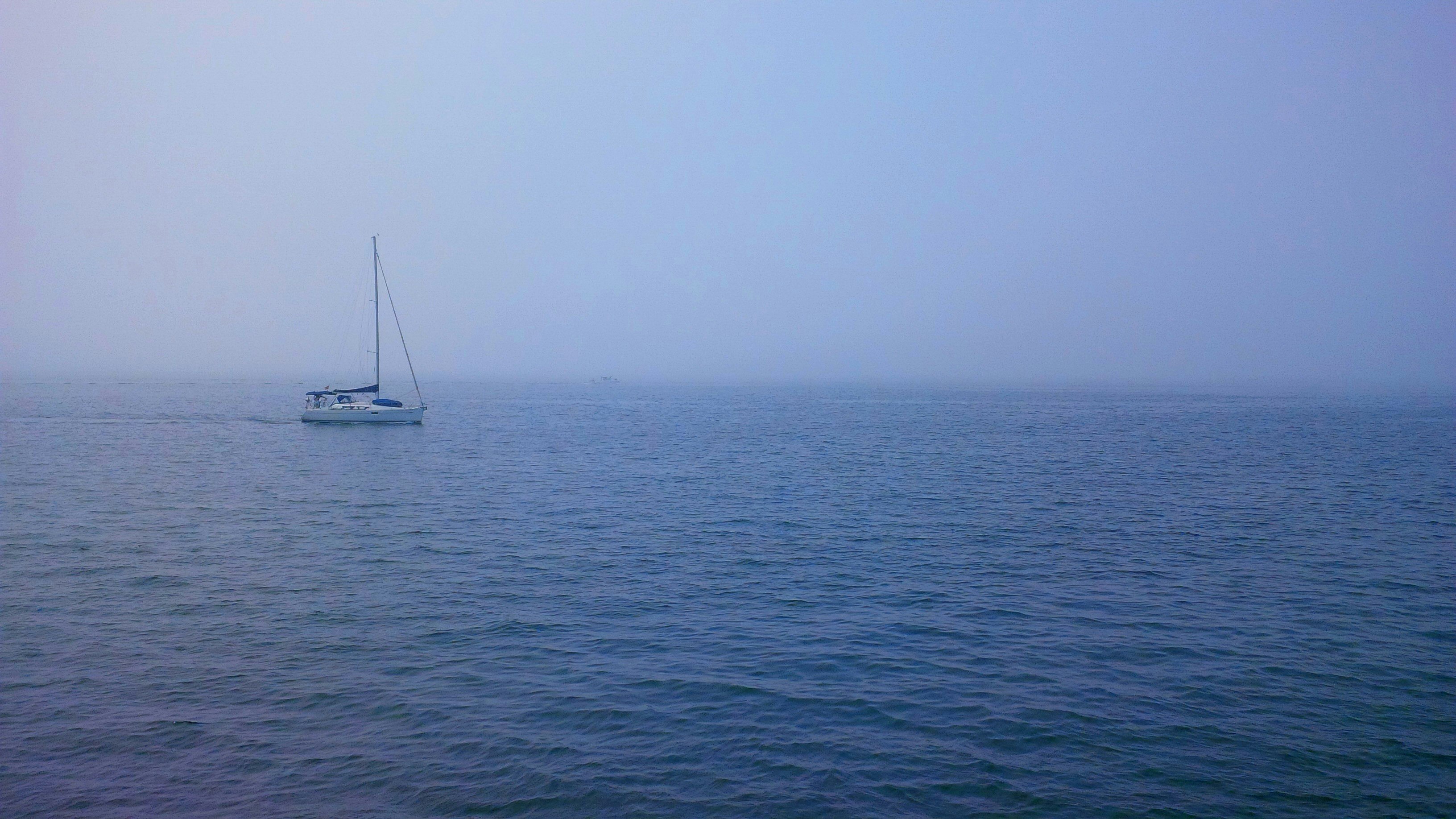 boat at the middle of the sea